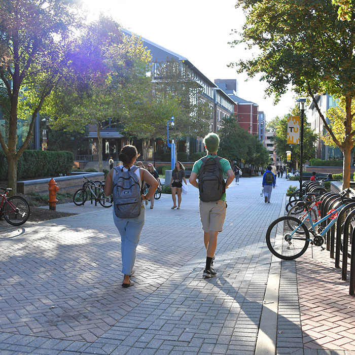 students walking on campus